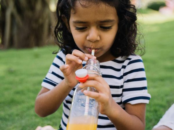 girl drinking juice